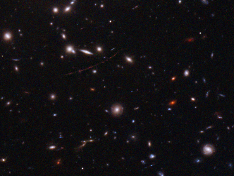 The Hubble Space Telescope has spotted the farthest star ever seen. The magnified galaxy looks like a stretched out red line with three dots. The single star is the middle one. The Hubble Space Telescope has spotted the farthest star ever seen. The magnified galaxy looks like a stretched out red line with three dots. The single star is the middle one.