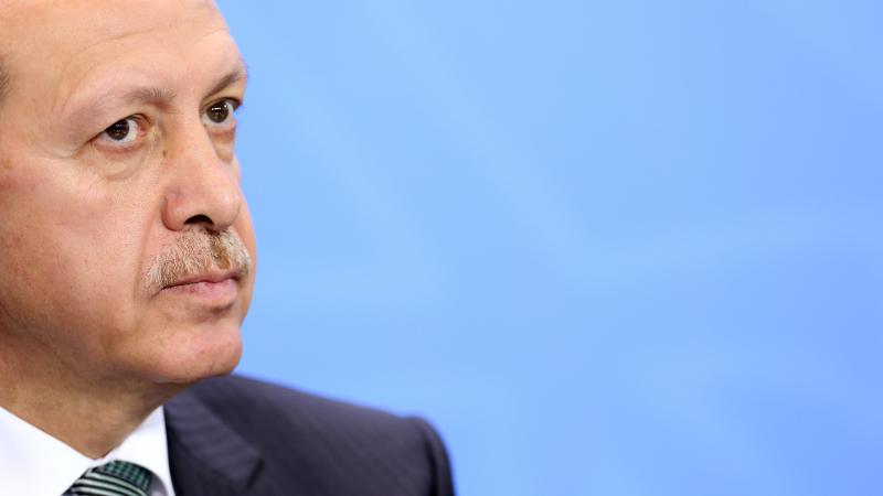 Turkish Prime Minister Recep Tayyip Erdogan speaks to the media following talks with German Chancellor Angela Merkel at the German federal Chancellery on February 4 in Berlin. Turkish Prime Minister Recep Tayyip Erdogan speaks to the media following talks with German Chancellor Angela Merkel at the German federal Chancellery on February 4 in Berlin.