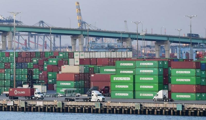 Containers are seen at the Port of Los Angeles on Sept. 28. A record number of cargo ships are stuck floating and waiting off the southern California coast amid a supply chain crisis that the Biden administration is hoping to ease. Containers are seen at the Port of Los Angeles on Sept. 28. A record number of cargo ships are stuck floating and waiting off the southern California coast amid a supply chain crisis that the Biden administration is hoping to ease.