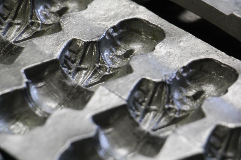 An antique mold holds the image of President Taft. An antique mold holds the image of President Taft.