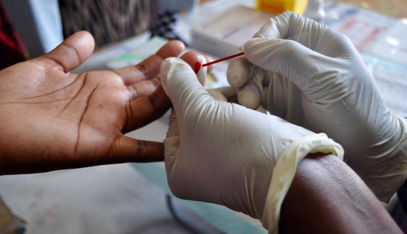 Drawing blood to test for HIV. Drawing blood to test for HIV.