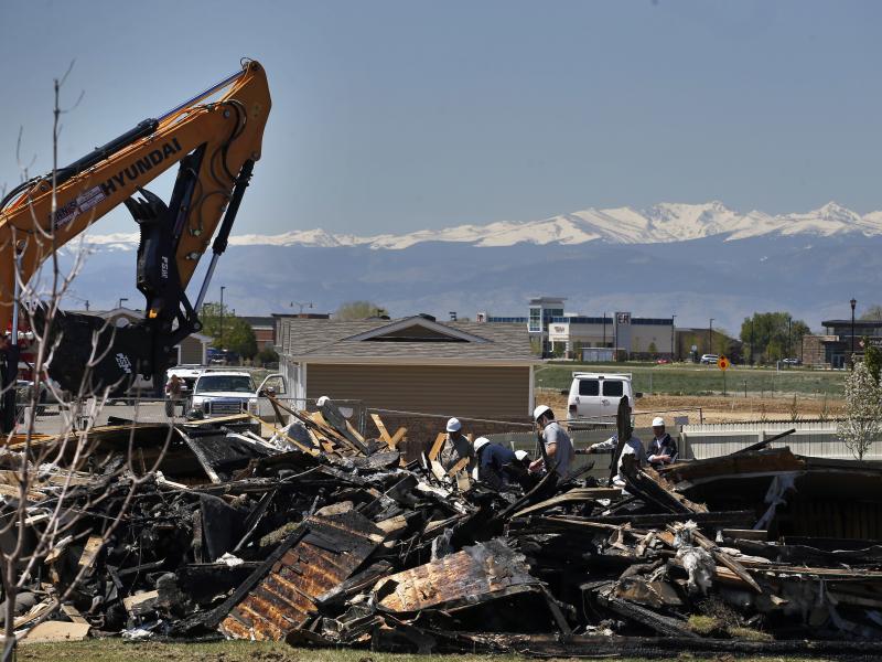 On May 4, workers dismantle the charred remains of a house in Firestone, Colo., where an unrefined gas line leak explosion killed two people in April. On May 4, workers dismantle the charred remains of a house in Firestone, Colo., where an unrefined gas line leak explosion killed two people in April.