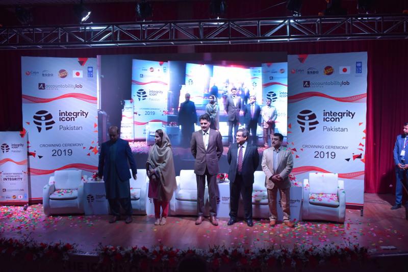 Pakistan's four Integrity Icon honorees and one stand-in: from left to right, Imran Zia, Rohana Kakar, Umar Tufail's cousin Mohammad Saleh (Tufail couldn't attend as he was stuck in the field working), Rizwan Alam Sherwani and Zahid Ali Khan Khattak. Pakistan's four Integrity Icon honorees and one stand-in: from left to right, Imran Zia, Rohana Kakar, Umar Tufail's cousin Mohammad Saleh (Tufail couldn't attend as he was stuck in the field working), Rizwan Alam Sherwani and Zahid Ali Khan Khattak.