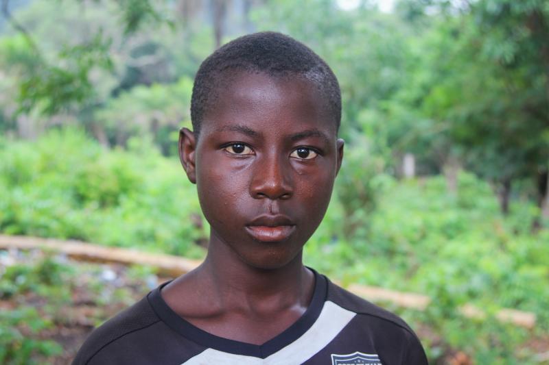 Sahr Tarawaly, 14, works several jobs to earn money to support his mom and two siblings. "I used to like mathematics," the round-faced teenager says. "Now I go down to the beach to fish, to have fish to eat." Sahr Tarawaly, 14, works several jobs to earn money to support his mom and two siblings. "I used to like mathematics," the round-faced teenager says. "Now I go down to the beach to fish, to have fish to eat."