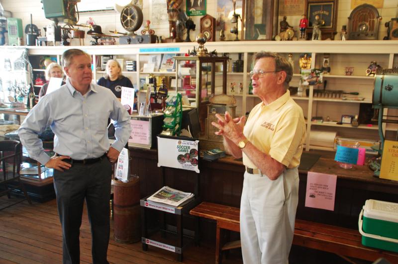 Lindsey Graham (left) and Bob Schroeder at Robie's Country Store in Hooksett, N.H. Lindsey Graham (left) and Bob Schroeder at Robie's Country Store in Hooksett, N.H.