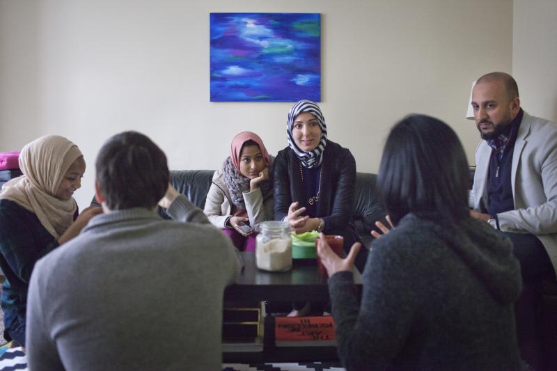 A group of young Muslim friends in Washington, D.C., meets occasionally to support each other in their work and discuss the struggles their community faces. A group of young Muslim friends in Washington, D.C., meets occasionally to support each other in their work and discuss the struggles their community faces.