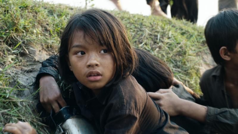 Sareum Srey Moch plays a young Loung Ung in Netflix's First They Killed My Father. Sareum Srey Moch plays a young Loung Ung in Netflix's First They Killed My Father.