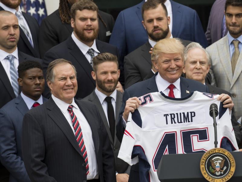 President Trump holds a jersey given to him by New England Patriots head coach Bill Belichick (left) alongside members of the team during a ceremony Wednesday at the White House honoring the 2017 Super Bowl champions. President Trump holds a jersey given to him by New England Patriots head coach Bill Belichick (left) alongside members of the team during a ceremony Wednesday at the White House honoring the 2017 Super Bowl champions.