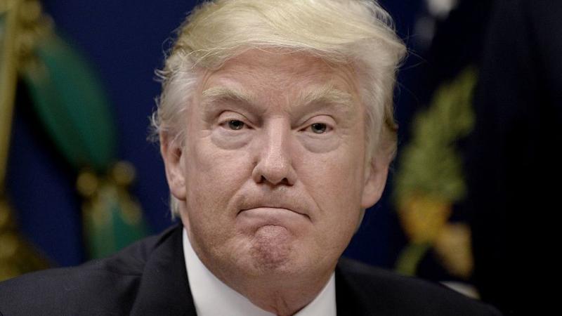 President Donald Trump signs executive orders at the Department of Defense on Friday. President Donald Trump signs executive orders at the Department of Defense on Friday.