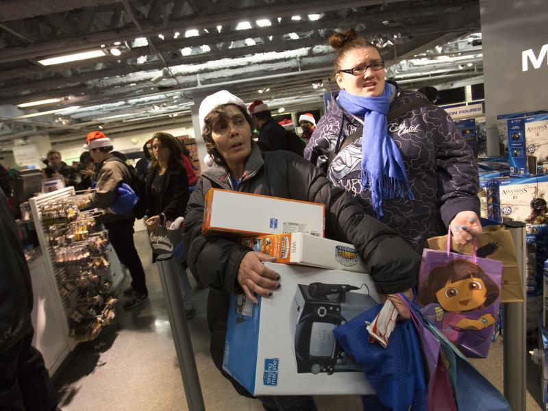 People line up to purchase items at the Black Thursday sale at the Toys 'R' Us store in Times Square on Nov. 22, 2012 in New York City. The store got a head start on the traditional Black Friday sales by opening their doors at 8 p.m. on Thanksgiving night People line up to purchase items at the Black Thursday sale at the Toys 'R' Us store in Times Square on Nov. 22, 2012 in New York City. The store got a head start on the traditional Black Friday sales by opening their doors at 8 p.m. on Thanksgiving night
