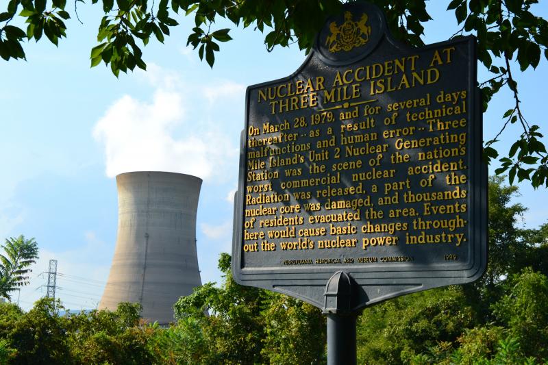 A historical sign memorializes the March 28, 1979, partial meltdown at Three Mile Island nuclear power plant. A historical sign memorializes the March 28, 1979, partial meltdown at Three Mile Island nuclear power plant.