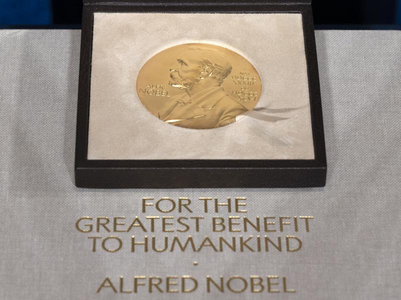 Displayed is a file photo of a Nobel Prize medal on Dec. 8, 2020. The Nobel Prize in economic sciences was awarded to three U.S-based professors for their pioneering work with "natural experiments." Displayed is a file photo of a Nobel Prize medal on Dec. 8, 2020. The Nobel Prize in economic sciences was awarded to three U.S-based professors for their pioneering work with "natural experiments."