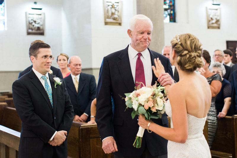 Jeni Stepien with her hand on Arthur Thomas' chest after he walked her down the aisle at her wedding last Friday. The groom, Paul Maenner, stands to the left. Jeni Stepien with her hand on Arthur Thomas' chest after he walked her down the aisle at her wedding last Friday. The groom, Paul Maenner, stands to the left.