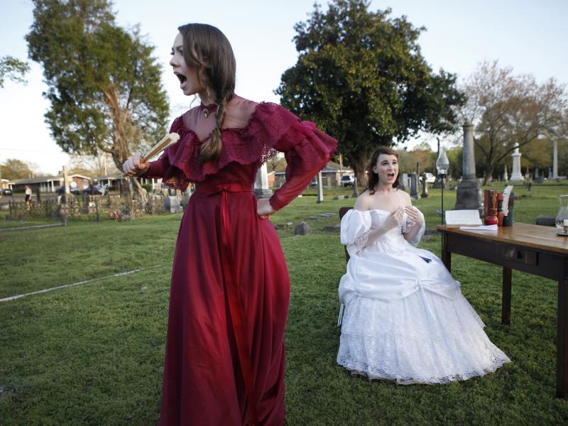 Kameron Shook, 17, and Brenna Paola, 17, perform as part of Tales From the Crypt in Friendship Cemetery in Columbus, Miss. Kameron Shook, 17, and Brenna Paola, 17, perform as part of Tales From the Crypt in Friendship Cemetery in Columbus, Miss.