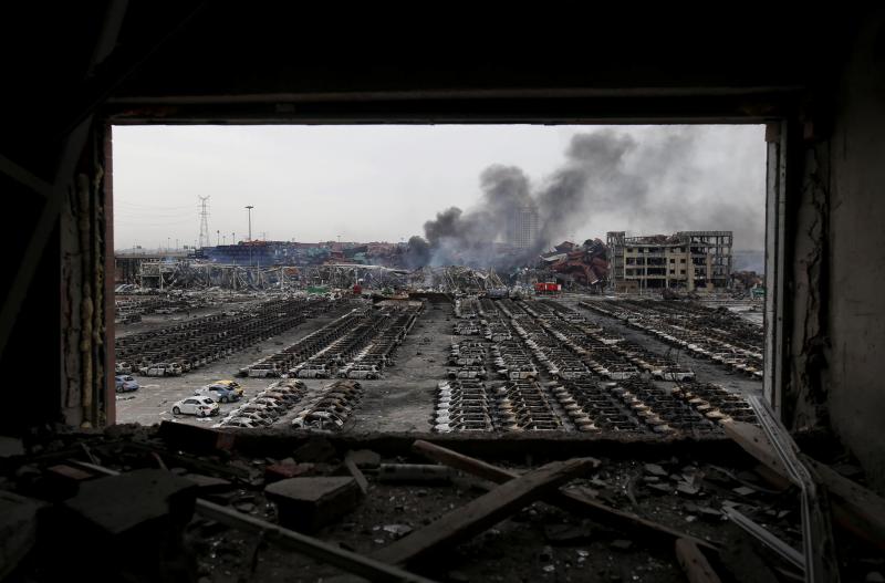 Smoke rises at the site of the explosions in Tianjin. Smoke rises at the site of the explosions in Tianjin.