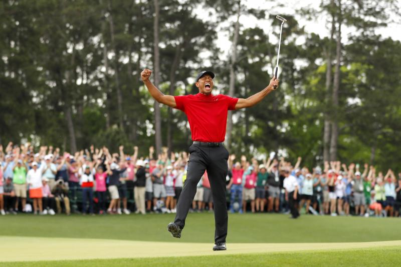 Tiger Woods won his fifth Masters title at Augusta National Golf Club on Sunday, nearly 11 years after his last major win. Tiger Woods won his fifth Masters title at Augusta National Golf Club on Sunday, nearly 11 years after his last major win.