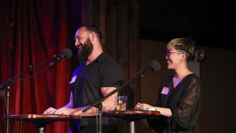 Contestants Till Manthey and Monica Thieu appear on Ask Me Another at the Bell House in Brooklyn, New York. Contestants Till Manthey and Monica Thieu appear on Ask Me Another at the Bell House in Brooklyn, New York.