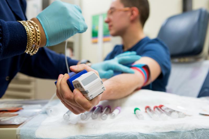 Andie Vaught grasps a stress toy in the shape of a truck as she prepares to have blood drawn as part of a clinical trial for a Zika vaccine at the National Institutes of Health in Bethesda, Md., in November 2016. Andie Vaught grasps a stress toy in the shape of a truck as she prepares to have blood drawn as part of a clinical trial for a Zika vaccine at the National Institutes of Health in Bethesda, Md., in November 2016.