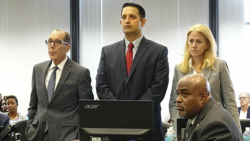 Nouman Raja (center) stands with his defense team at his trial in West Palm Beach, Fla. Raja, a former Palm Beach Gardens police officer, was convicted for shooting and killing stranded motorist Corey Jones in 2015. Nouman Raja (center) stands with his defense team at his trial in West Palm Beach, Fla. Raja, a former Palm Beach Gardens police officer, was convicted for shooting and killing stranded motorist Corey Jones in 2015.