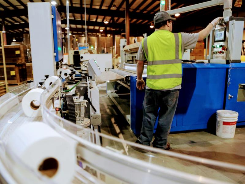 Local demand from individuals, senior centers, stores, and the state prison system is unspooling every roll as fast as the workers can wind them. Local demand from individuals, senior centers, stores, and the state prison system is unspooling every roll as fast as the workers can wind them.