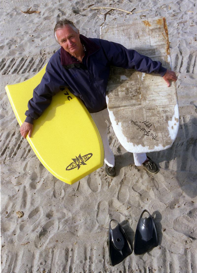 Tom Morey, inventor of the Boogie Board, is photographed on Capistrano Beach holding a newer model (left) and (right) his original 1971 Boogie Board. Tom Morey, inventor of the Boogie Board, is photographed on Capistrano Beach holding a newer model (left) and (right) his original 1971 Boogie Board.