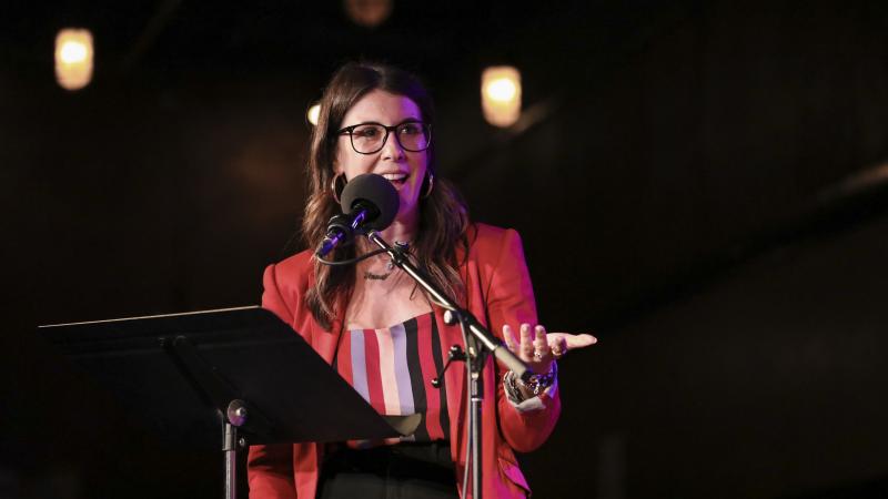 HQ Words host Anna Roisman leads a word game Ask Me Another at the Bell House in Brooklyn, New York. HQ Words host Anna Roisman leads a word game Ask Me Another at the Bell House in Brooklyn, New York.