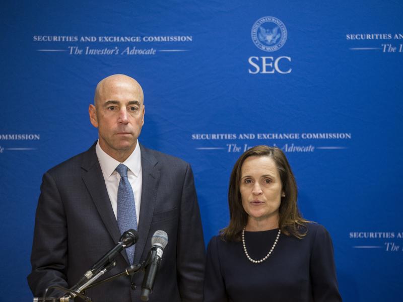 Securities and Exchange Commission Co-Directors of Enforcement Stephanie Avakian and Steven Peikin speak during a news conference in 2018. Avakian and Peikin say their office is aggressively pursuing enforcement related to the coronavirus pandemic. Securities and Exchange Commission Co-Directors of Enforcement Stephanie Avakian and Steven Peikin speak during a news conference in 2018. Avakian and Peikin say their office is aggressively pursuing enforcement related to the coronavirus pandemic.