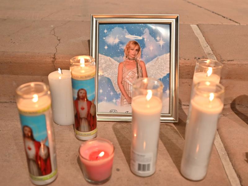 Candles surround a photo of cinematographer Halyna Hutchins during a vigil on Oct. 23 in Albuquerque, New Mexico. The American Film Institute established a scholarship in honor of Hutchins, who was killed by a prop gun on the set of the movie "Rust" last Candles surround a photo of cinematographer Halyna Hutchins during a vigil on Oct. 23 in Albuquerque, New Mexico. The American Film Institute established a scholarship in honor of Hutchins, who was killed by a prop gun on the set of the movie "Rust" last