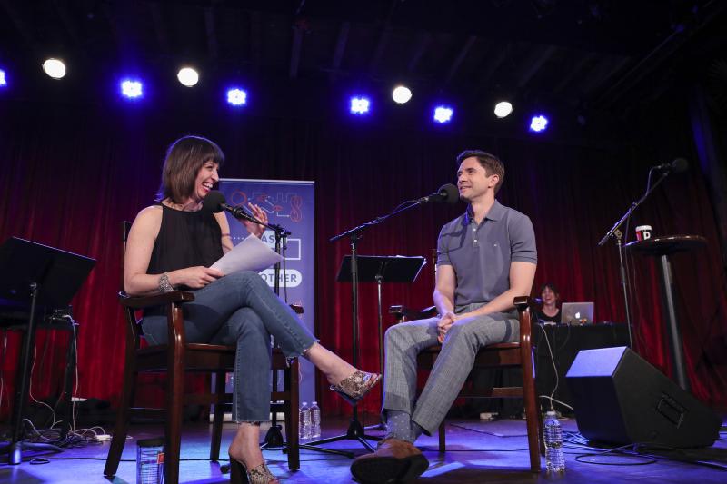 Ophira Eisenberg interviews Topher Grace on Ask Me Another at the Bell House in Brooklyn, New York. Ophira Eisenberg interviews Topher Grace on Ask Me Another at the Bell House in Brooklyn, New York.
