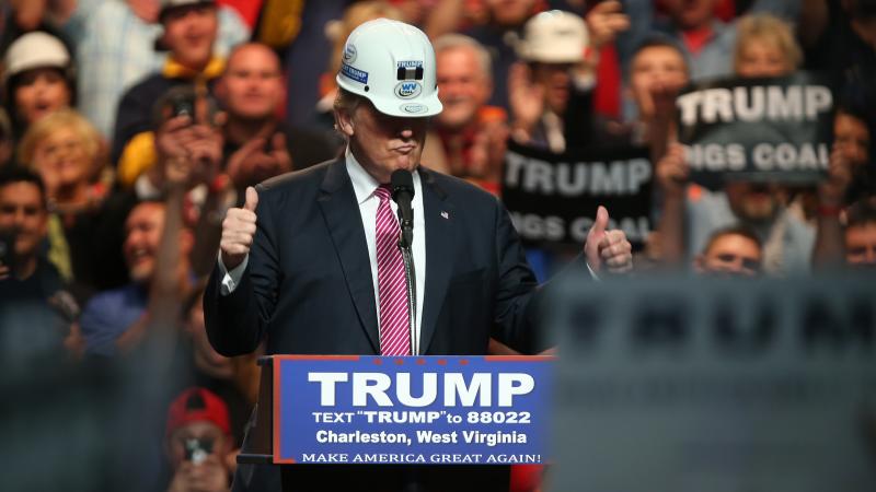 Then-presidential candidate Donald Trump models a hard hat during his rally at the Charleston Civic Center on May 5, 2016 in Charleston, West Virginia. Then-presidential candidate Donald Trump models a hard hat during his rally at the Charleston Civic Center on May 5, 2016 in Charleston, West Virginia.