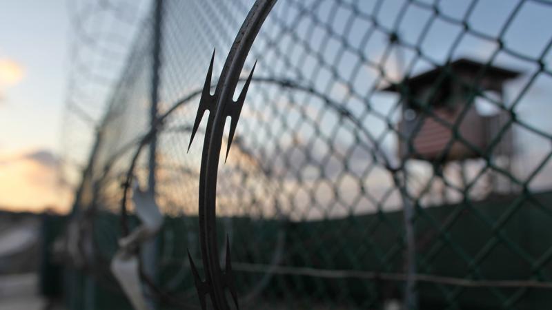 The sun rises over the detention facility at the Guantánamo Bay U.S. Naval Base in Cuba, in this May 13, 2009, photo reviewed by the U.S. military. The sun rises over the detention facility at the Guantánamo Bay U.S. Naval Base in Cuba, in this May 13, 2009, photo reviewed by the U.S. military.
