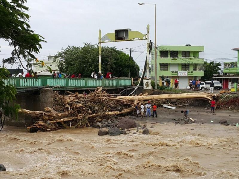 Rivers remained swollen and choked with debris in Roseau, Dominica, on Friday after Tropical Storm Erika had passed Rivers remained swollen and choked with debris in Roseau, Dominica, on Friday after Tropical Storm Erika had passed