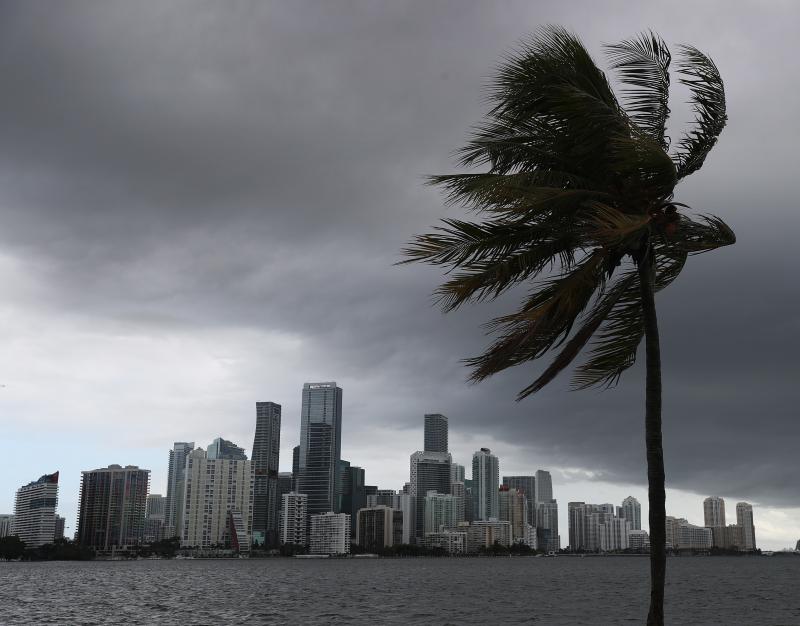 Storm clouds are seen over Miami as Hurricane Isaias approaches the east coast of Florida on Saturday. Storm clouds are seen over Miami as Hurricane Isaias approaches the east coast of Florida on Saturday.