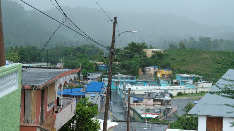 Houses from a seaside neighborhood are seen as Tropical Storm Karen approaches. Houses from a seaside neighborhood are seen as Tropical Storm Karen approaches.