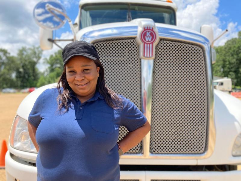 Pamela Williams, a driving instructor with DSC Training Academy, stands in front of one of the academy's trucks on June 29. Williams has been driving for seven years and enjoys seeing the country from the road. Pamela Williams, a driving instructor with DSC Training Academy, stands in front of one of the academy's trucks on June 29. Williams has been driving for seven years and enjoys seeing the country from the road.