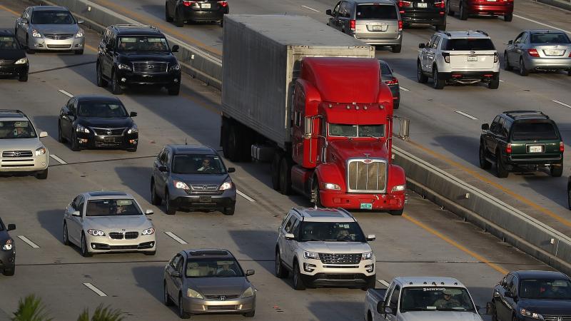 A tractor-trailer rolls along the highway in Miami last November. The trucking industry needs to hire almost 900,000 more drivers to meet rising demand, according to an industry analysis. A tractor-trailer rolls along the highway in Miami last November. The trucking industry needs to hire almost 900,000 more drivers to meet rising demand, according to an industry analysis.