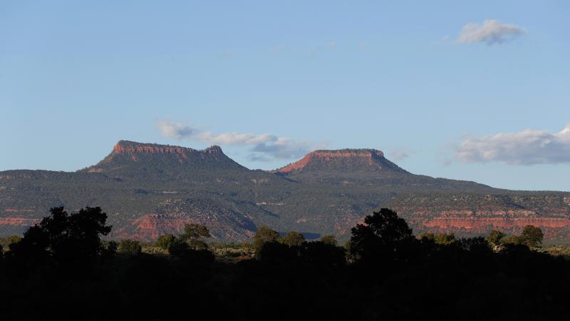 The two bluffs that inspired the name of the Bears Ears National Monument, seen at sunset outside Blanding, Utah. On Thursday, more than two years after the Trump administration announced plans to shrink the monument and others, federal managers have fina The two bluffs that inspired the name of the Bears Ears National Monument, seen at sunset outside Blanding, Utah. On Thursday, more than two years after the Trump administration announced plans to shrink the monument and others, federal managers have fina