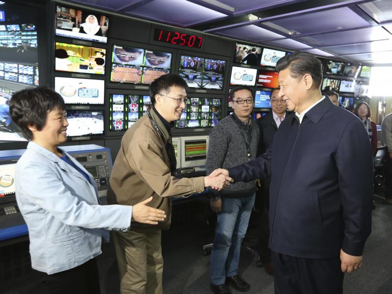Chinese leader Xi Jinping (right) shakes hands with staff members at the control room of China Central Television in Beijing in 2016. Chinese leader Xi Jinping (right) shakes hands with staff members at the control room of China Central Television in Beijing in 2016.