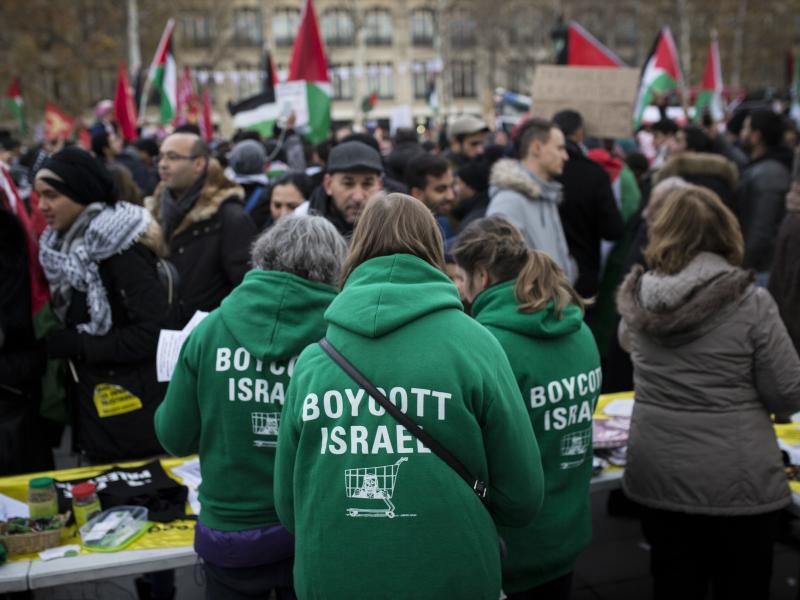 Demonstrators advocating the movement to boycott, divest from and sanction Israel, known as BDS, gather for a protest last year in Paris. On Thursday, U.S. Secretary of State Mike Pompeo announced a new policy specifically countering the global BDS campai Demonstrators advocating the movement to boycott, divest from and sanction Israel, known as BDS, gather for a protest last year in Paris. On Thursday, U.S. Secretary of State Mike Pompeo announced a new policy specifically countering the global BDS campai