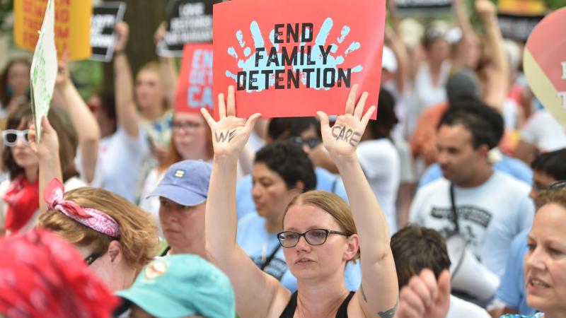 People demonstrate in Washington, D.C., on Thursday, demanding an end to the separation of migrant children from their parents. On Friday, the Justice Department said in a court filing that "the government will not separate families but detain families to People demonstrate in Washington, D.C., on Thursday, demanding an end to the separation of migrant children from their parents. On Friday, the Justice Department said in a court filing that "the government will not separate families but detain families to