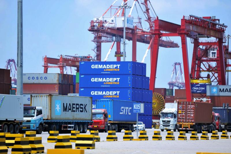 Containers are transferred at a port in Qingdao in China's eastern Shandong province on July 6, 2018. The Trump administration announced plans to levy tariffs on another $200 billion of Chinese goods as trade tensions escalate. Containers are transferred at a port in Qingdao in China's eastern Shandong province on July 6, 2018. The Trump administration announced plans to levy tariffs on another $200 billion of Chinese goods as trade tensions escalate.