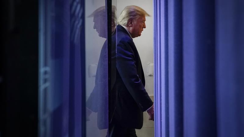 President Trump exits a briefing on the coronavirus pandemic at the White House Thursday. President Trump exits a briefing on the coronavirus pandemic at the White House Thursday.