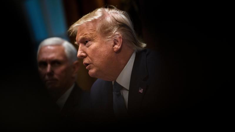 President Trump addresses a Cabinet meeting last month at the White House, as Vice President Pence looks on in the background. On Friday, the Trump administration suggested some of California's federal funds could be in jeopardy over the state's requireme President Trump addresses a Cabinet meeting last month at the White House, as Vice President Pence looks on in the background. On Friday, the Trump administration suggested some of California's federal funds could be in jeopardy over the state's requireme