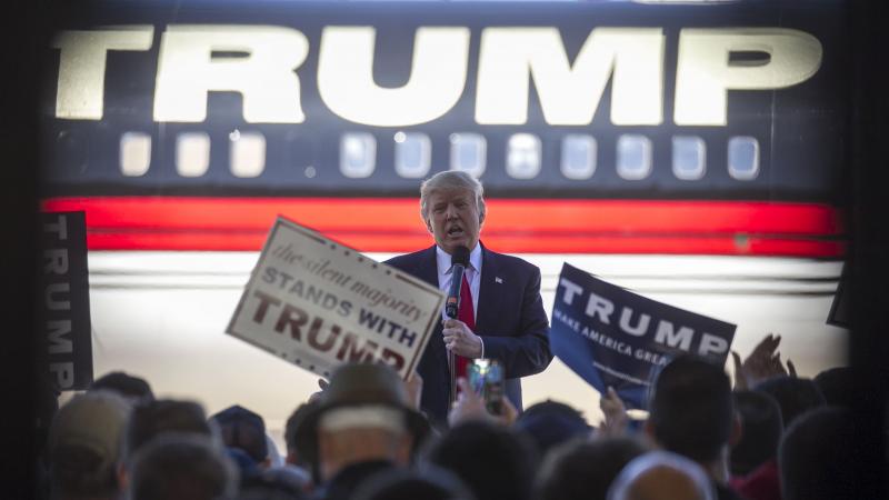 Republican presidential candidate Donald Trump speaks at a campaign rally in an airplane hangar in Bentonville, Ark., on Saturday. Republican presidential candidate Donald Trump speaks at a campaign rally in an airplane hangar in Bentonville, Ark., on Saturday.