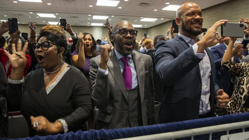 Supporters of President Trump cheer as he arrives to launch Black Voices for Trump at an Atlanta event. Supporters of President Trump cheer as he arrives to launch Black Voices for Trump at an Atlanta event.