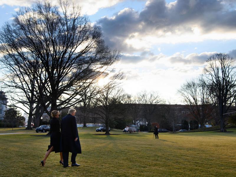 President Trump and first lady Melania Trump make their way to board Marine One as they depart the White House for the last time. President Trump and first lady Melania Trump make their way to board Marine One as they depart the White House for the last time.