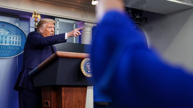 President Trump takes a question during a news conference at the White House on Sunday, where he dismissed reporting from the "New York Times" that he has paid little or no federal income taxes in recent years as "fake news." President Trump takes a question during a news conference at the White House on Sunday, where he dismissed reporting from the "New York Times" that he has paid little or no federal income taxes in recent years as "fake news."
