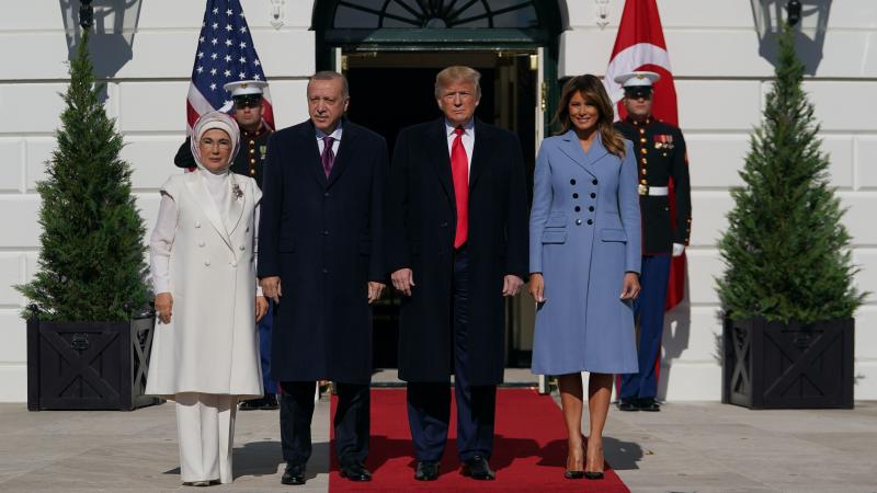President Trump and first lady Melania Trump meet with Turkey's President Recep Tayyip Erdogan and his wife, Emine Erdogan, outside the White House on Wednesday. President Trump and first lady Melania Trump meet with Turkey's President Recep Tayyip Erdogan and his wife, Emine Erdogan, outside the White House on Wednesday.
