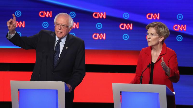 Democratic presidential candidates Bernie Sanders and Elizabeth Warren say corporate America has put profits before workers by shifting jobs to other countries. Democratic presidential candidates Bernie Sanders and Elizabeth Warren say corporate America has put profits before workers by shifting jobs to other countries.