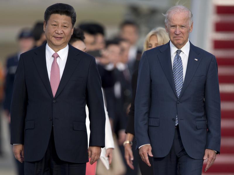 Chinese President Xi Jinping and then Vice President Joe Biden attend an arrival ceremony in Andrews Air Force Base, Md., in 2015. Biden is under pressure from both the left and the right to continue taking a hard line on trade with China. Chinese President Xi Jinping and then Vice President Joe Biden attend an arrival ceremony in Andrews Air Force Base, Md., in 2015. Biden is under pressure from both the left and the right to continue taking a hard line on trade with China.